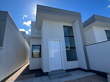 CASA COM PASSAGEM LOTEAMENTO ORQU�DIA